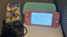 Good
													Nintendo Switch Lite - Coral, photo 1 of 12