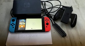 Mint
													Nintendo Switch - Red & Blue, 32 GB, photo 1 of 7