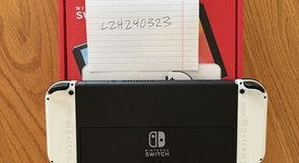 Mint
													Nintendo Switch - OLED - White, 64 GB, photo 2 of 7