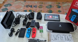 Mint
													Nintendo Switch - OLED - Red & Blue, 64 GB, photo 1 of 17