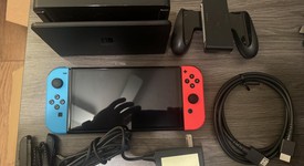 Good
													Nintendo Switch - OLED - Red & Blue, 64 GB, photo 1 of 3