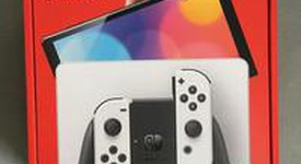 New
													Nintendo Switch - OLED - White, 64 GB, photo 3 of 10