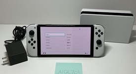 Mint
													Nintendo Switch - OLED - White, 64 GB, photo 1 of 6
