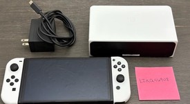 Good
													Nintendo Switch - OLED - White, 64 GB, photo 1 of 9