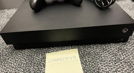 Good
													Xbox One X (2017) - Black, Standard, photo 1 of 10