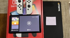 Mint
													Nintendo Switch - OLED - White, 64 GB, photo 1 of 7