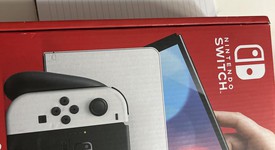 Mint
													Nintendo Switch - OLED - White, 64 GB, photo 4 of 12