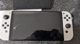 Mint
													Nintendo Switch - OLED - White, 64 GB, photo 5 of 7