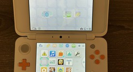 Mint
													New Nintendo 2DS XL - White & Orange, 1 GB, photo 4 of 7