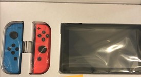 New
													Nintendo Switch - Red & Blue, 32 GB, photo 2 of 2