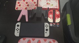 Mint
													Nintendo Switch - OLED - White, 64 GB, photo 4 of 21
