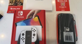 New
													Nintendo Switch - OLED - White, 64 GB, photo 1 of 2