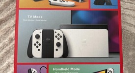 Mint
													Nintendo Switch - OLED - White, 64 GB, photo 4 of 14