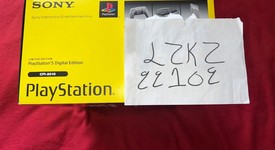 New
													PlayStation 5 Slim Digital Edition (2023) - Gray, 1 TB, 30th Anniversary, photo 4 of 4