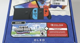 New
													Nintendo Switch - OLED - Red & Blue, 64 GB, photo 1 of 9