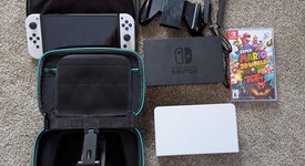 Mint
													Nintendo Switch - OLED - White, 64 GB, photo 1 of 11