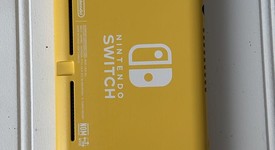 Mint
													Nintendo Switch Lite - Yellow, photo 2 of 11