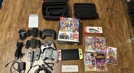 Good
													Nintendo Switch - OLED - Black, 64 GB, Super Smash Bros., photo 1 of 10