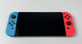 New
													Nintendo Switch - OLED - Red & Blue, 64 GB, photo 4 of 9