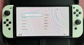 Mint
													Nintendo Switch - OLED - White, 64 GB, photo 5 of 14