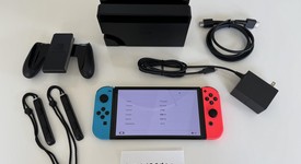 Mint
													Nintendo Switch - OLED - Red & Blue, 64 GB, photo 1 of 18