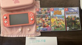 Mint
													Nintendo Switch Lite - Coral, photo 1 of 6