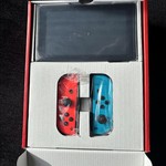 New Nintendo Switch - 32 GB, Red & Blue