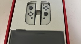 New
													Nintendo Switch - OLED - White, 64 GB, photo 2 of 2