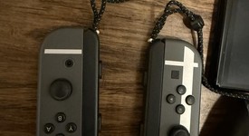 Good
													Nintendo Switch - OLED - Black, 64 GB, Super Smash Bros., photo 4 of 13