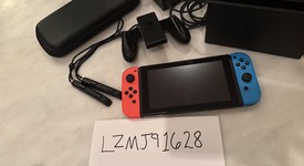 Fair
													Nintendo Switch - Red & Blue, 32 GB, photo 2 of 5