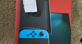 Mint
													Nintendo Switch - Red & Blue, 32 GB, photo 1 of 1