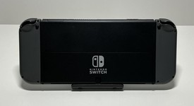 Good
													Nintendo Switch - OLED - Black, 64 GB, Super Smash Bros., photo 5 of 6