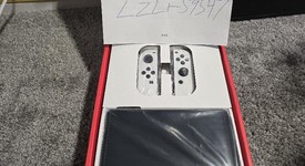 New
													Nintendo Switch - OLED - White, 64 GB, photo 3 of 4