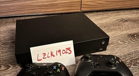 Mint
													Xbox One X (2017) - Black, Standard, photo 1 of 2