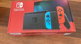 New
													Nintendo Switch - Red & Blue, 32 GB, photo 1 of 4