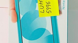 New
													Nintendo Switch Lite - Turquoise, photo 1 of 1