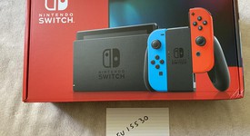 New
													Nintendo Switch - Red & Blue, 32 GB, photo 1 of 3