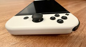 Mint
													Nintendo Switch - OLED - White, 64 GB, photo 4 of 11