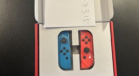 New
													Nintendo Switch - Red & Blue, 32 GB, photo 3 of 4