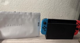 Mint
													Nintendo Switch - Red & Blue, 32 GB, photo 2 of 12