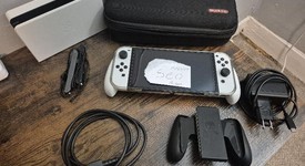 Mint
													Nintendo Switch - OLED - White, 64 GB, photo 1 of 5