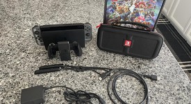 Mint
													Nintendo Switch - OLED - Black, 64 GB, Super Smash Bros., photo 1 of 15