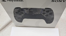 New
													DualSense Wireless Controller - Camo, photo 2 of 3