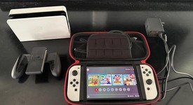 Good
													Nintendo Switch - OLED - White, 64 GB, photo 1 of 7