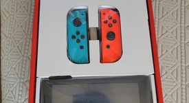 New
													Nintendo Switch - Red & Blue, 32 GB, photo 1 of 2