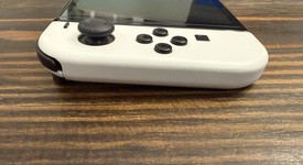 Mint
													Nintendo Switch - OLED - White, 64 GB, photo 4 of 13