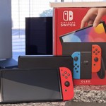 Mint Nintendo Switch - OLED - 64 GB, Red & Blue