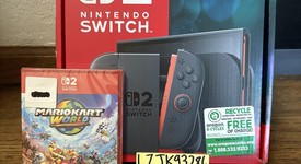 New
													Nintendo Switch 2 - Red & Blue, Standard, photo 1 of 2