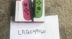 New
													Nintendo Switch Joy-Con (L-R) - Pink & Green, photo 1 of 2