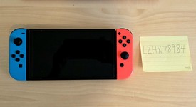 Good
													Nintendo Switch - OLED - Red & Blue, 64 GB, photo 2 of 7